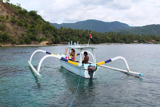 Amazing Blue Lagoon Snorkeling with Private Hotel Transfer - Padangbai fishing village and the boat to Blue Lagoon