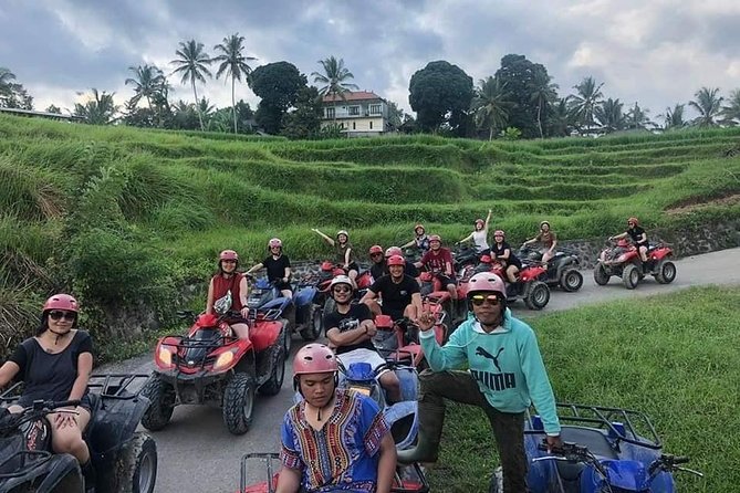 ATV Quad Bike Through Tunnel and Waterfall in Bali - Safety Briefing, Solo Quads, and Tandem Riding