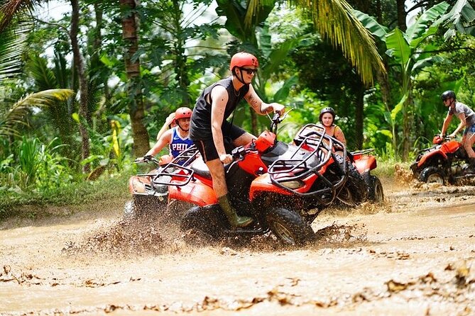 Bali ATV Quad Bike Adventure with Gorilla Cave Pass By Waterfall - Riding the muddy trails near Gianyar