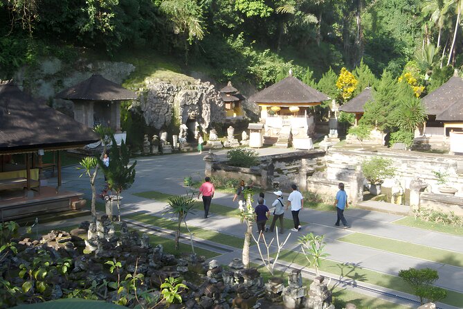 Bali Cycling and Ubud Waterfall Tour - Ubud Palace brings you into the town center