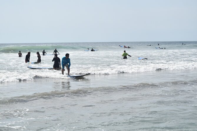 Bali Surf Lesson in Kuta by Dekom - Private coaching versus a group of 15