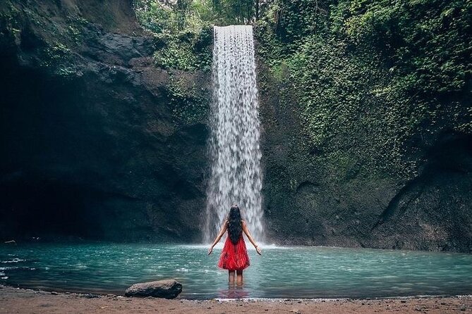 Blue Lagoon Snorkeling - Lunch - Kantolampo - Tibumana Waterfall - Kanto Lampo Waterfall and its photo-friendly rocks