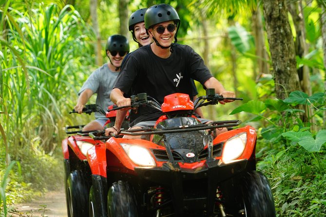 Full-Day Bali Adventure Tour with Quad Bikes and Rafting - Quad biking through rice fields and jungle tracks