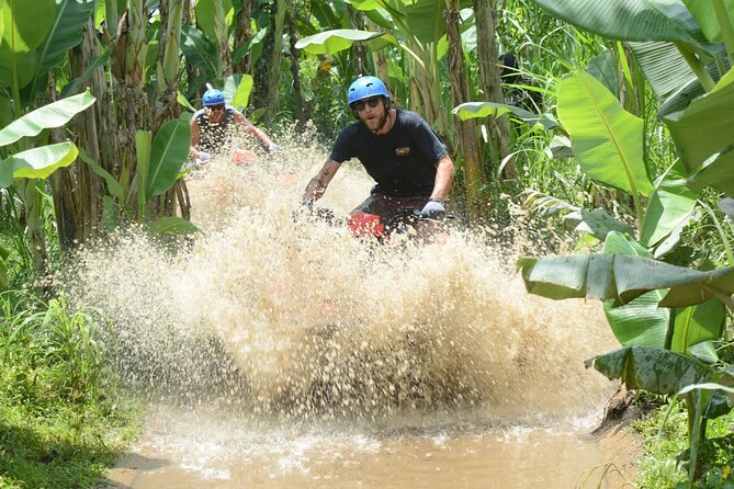 Full-Day Bali Adventure Tour with Quad Bikes and Rafting - Rafting the Ayung River past waterfalls