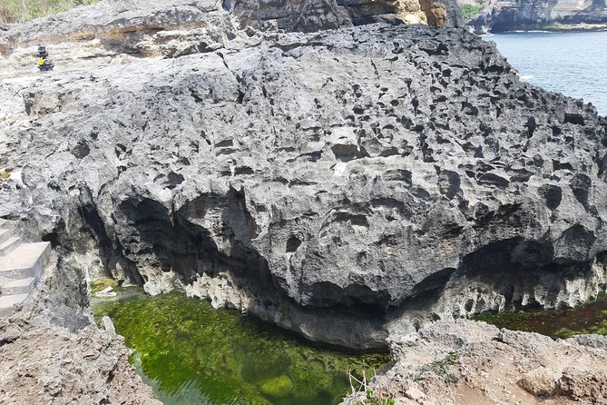 Full-Day Nusa Penida Island Private Tour with Local Guide - Kelingking Cliff, the visual centerpiece