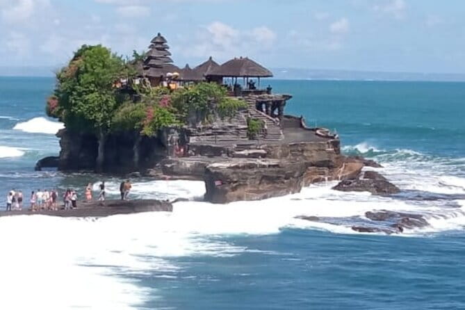 Full Day Private Tour All Inclusive Hidden Gems Bali Waterfall - Kanto Lampo: Water Spreading Across Stone Steps