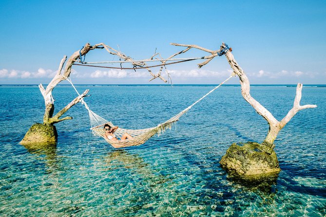 Gili Islands Private Tour: Gili Trawangan, Gili Meno & Gili Air – Full Day - Glass-bottom boat views between water stops