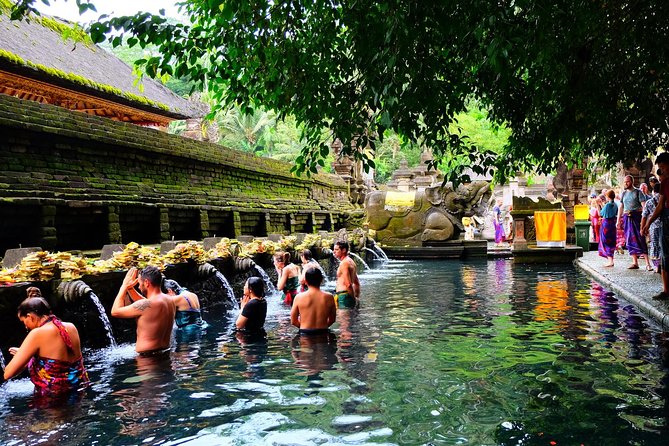 Half-Day Ubud Electric Cycling Tour to Tirta Empul Water Temple - Arriving at Tirta Empul Water Temple