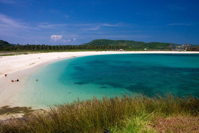 Instagramable Beach Hopping Trip - Selong Belanak Beach and its gentle curve of sand