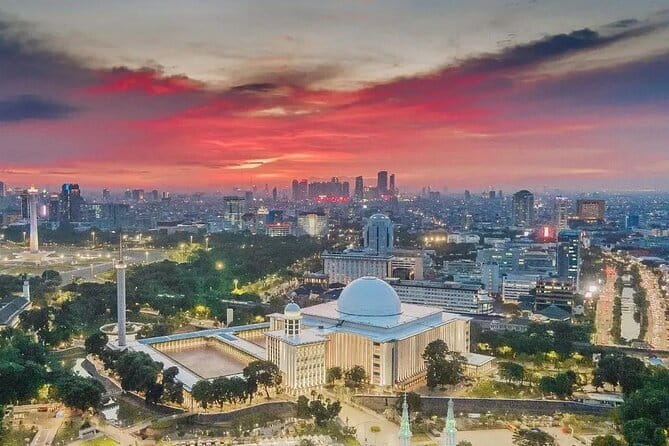 Jakarta Walking Tour with Public Transportation Visiting Sites - Selamat Datang Monument and the final Monas stop