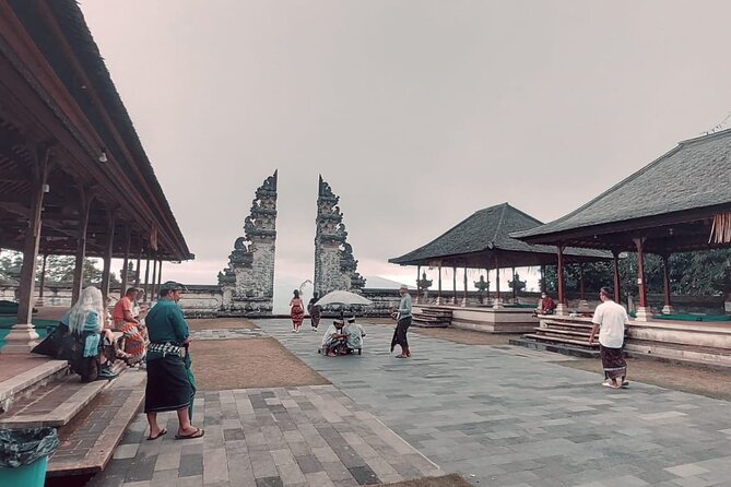Lempuyang Gate of Heaven and City Tour - Tirta Gangga’s ponds, fish, and royal setting