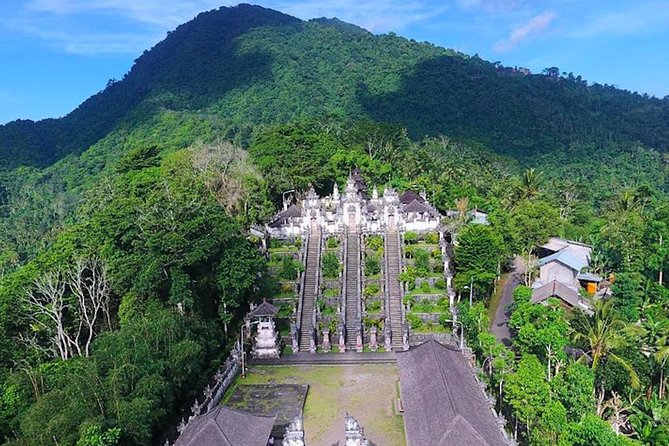 Lempuyang Gates of Heaven, Tirta Gangga Temple Swim & Jungle Waterfalls - Tukad Cepung Waterfall and its cave-like setting