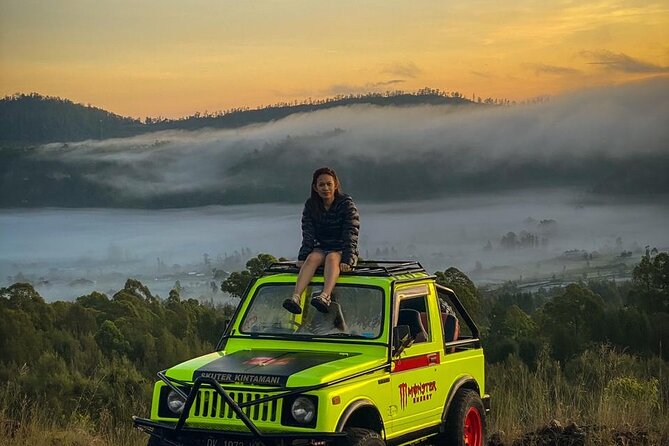 Mount Batur Jeep Sunrise Tour - All Inclusive - Riding across Mount Batur’s black lava