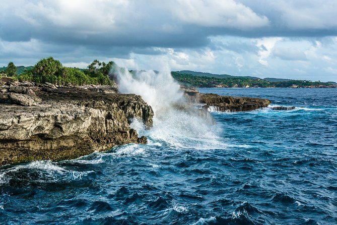 Nusa Lembongan Island: Snorkeling & Mangrove Forest Day Tour - Yellow Bridge connects two island worlds