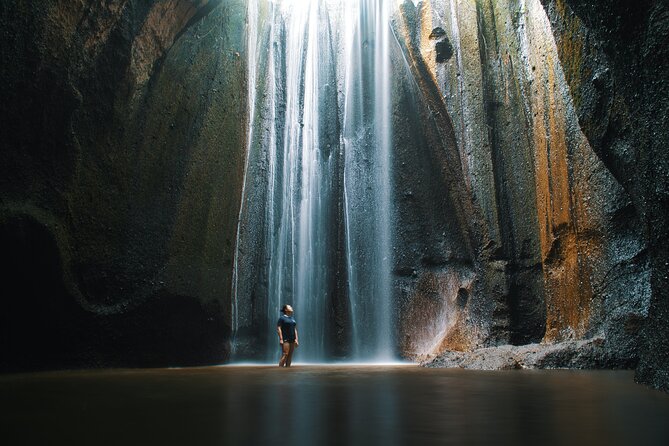 Private Waterfall Tour Feature Tukad Cepung, Tibumana and Kanto Lampo - Tukad Cepung: sunlight in a stone chamber