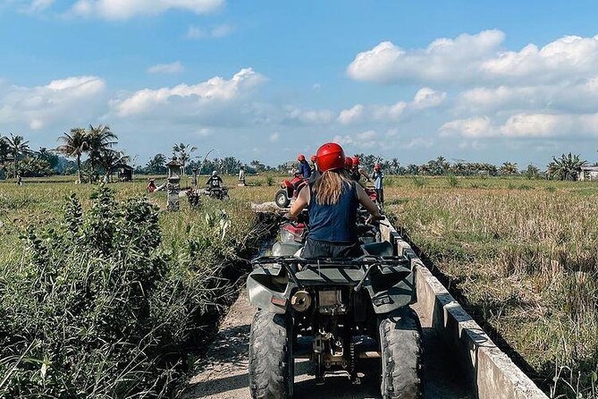 Quadbike Adventure with Tunnel and Waterfall Tour in Bali - River, jungle, and village sections