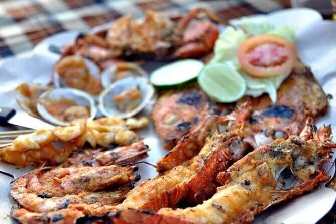 Romantic Seafood Dinner at Jimbaran Beach Bali include Sunset - Arriving at Ganesha Cafebay