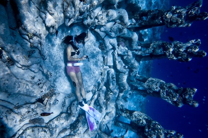 Snorkeling with turtle and statue in Gilis - How the $55 price measures up