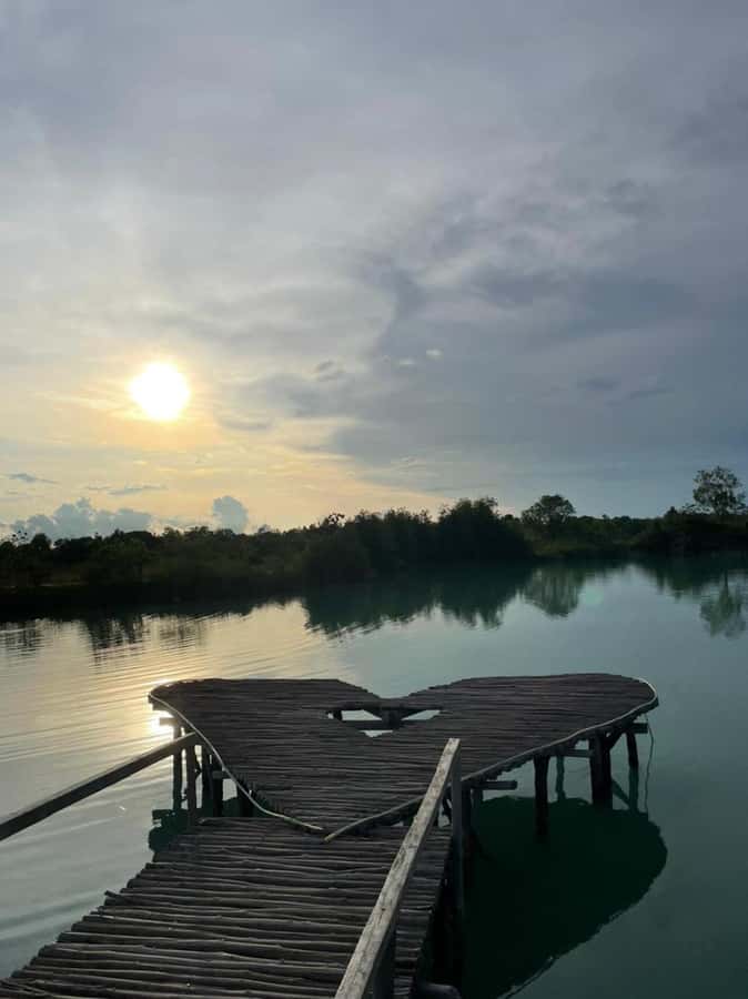 Teluk Sebong: Bintan Desert and Blue Lake Trip - Optional stops, seafood, and local shopping