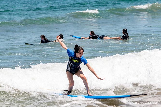 The best surf lessons in Kuta - Beach practice: learning the movement on dry land