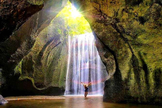 Tukad Cepung Besakih Lempuyang Temple Best of East Bali Tour - Tukad Cepung Waterfall requires sturdy footing