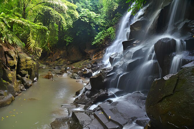 Ubud Bali: Rice Terrace, Waterfall and Tirta empul Day Tour - Kanto Lampo Waterfall is the playful nature stop